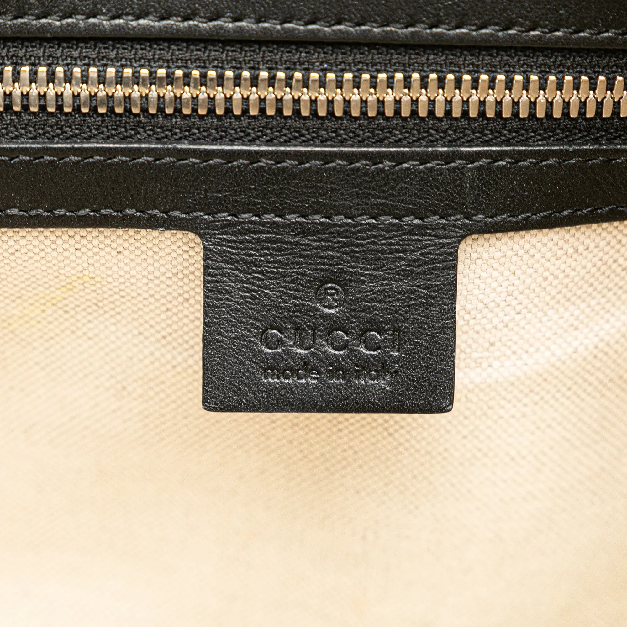 GG Embossed Leather Crossbody