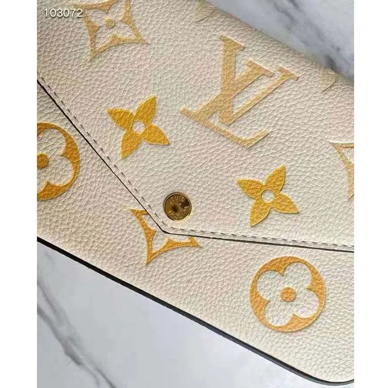 Louis Vuitton Women Félicie Pochette Cream Saffron Monogram Empreinte Embossed Supple Grained Cowhide